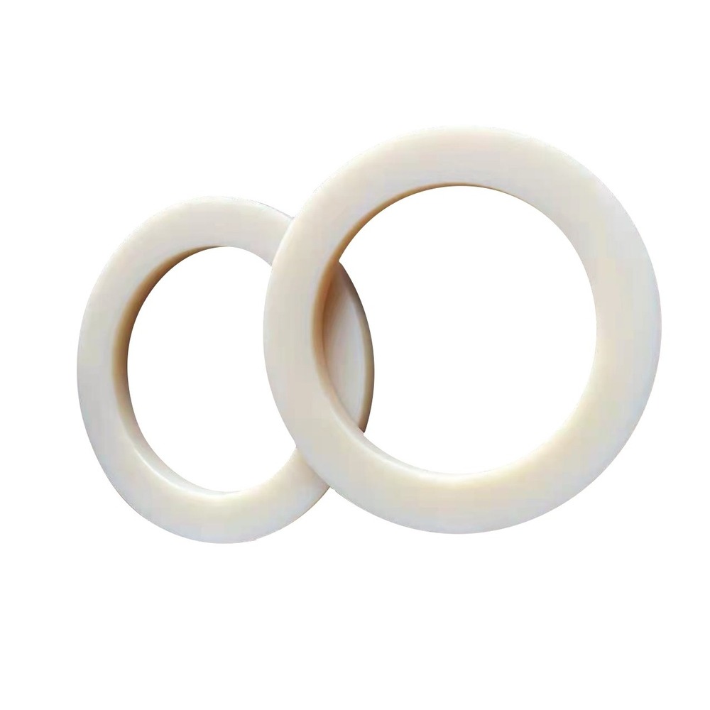 Miếng đệm nylon dùng để định vị lưỡi cắt tấm thép.
   